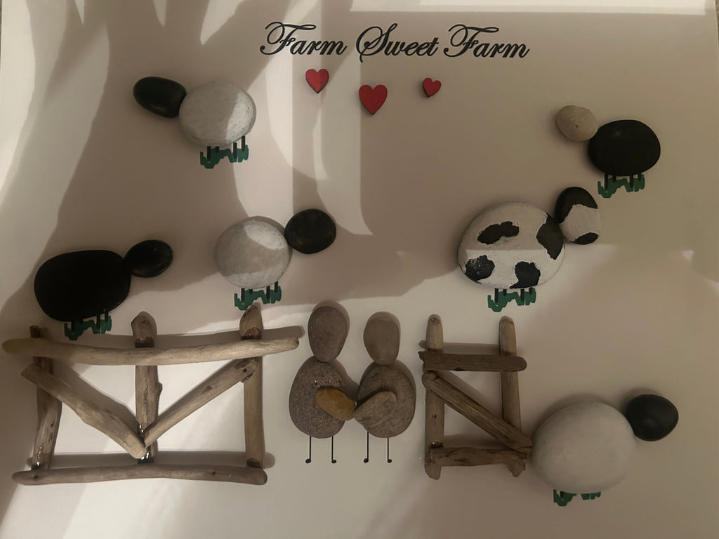 Handmade Farm Sweet Farm pebble art scene with sheep, cow, hen, chicks and driftwood gates