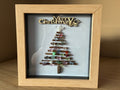 Driftwood Christmas tree with sea glass baubles and angel pebble art in a wooden frame
