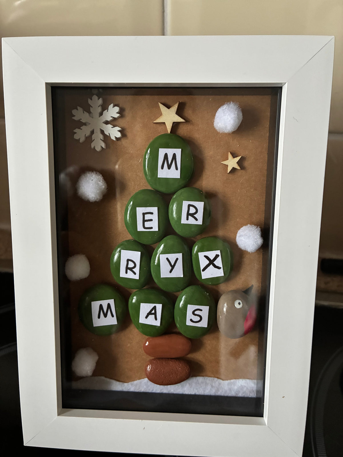 Merry Xmas green letter pebble Christmas tree with robin and snowballs in a white frame